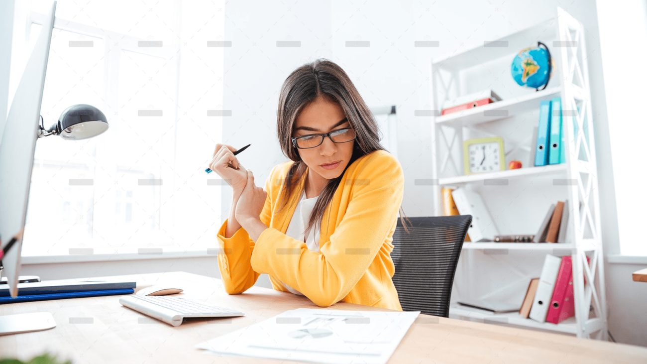 demo-attachment-449-businesswoman-analysing-document-P8WSNMC