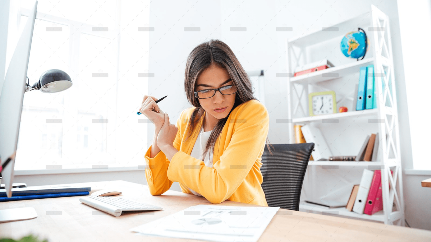 demo-attachment-449-businesswoman-analysing-document-P8WSNMC